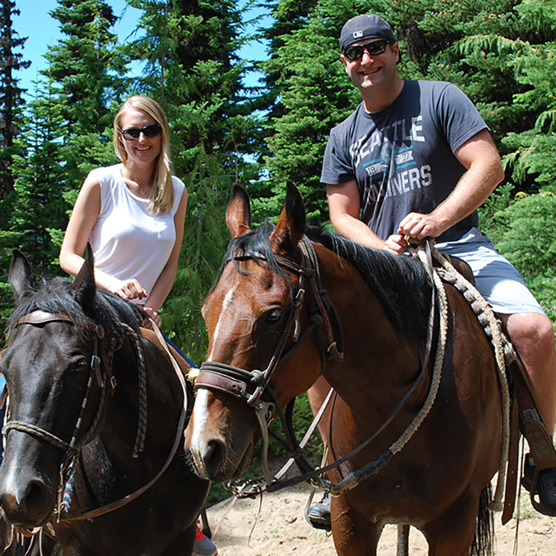 Tim and Tove on horseback at Crystal Mountain Resort