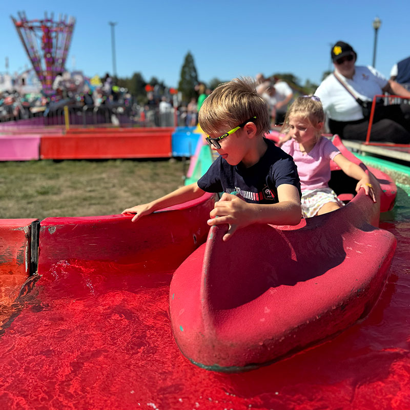 Our kids on a canoe ride at the Washington State Fair