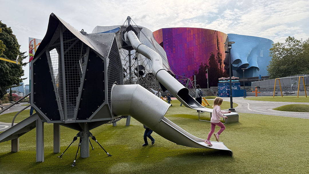 The Seattle Center playground with MoPop in the background